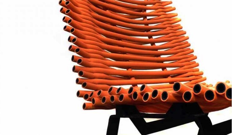 Orange rubber chair seen @ Scrap Lab